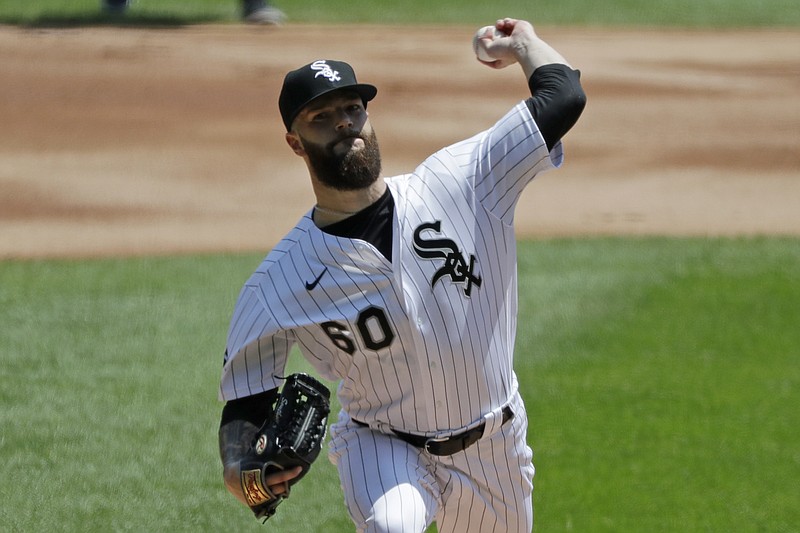 Chicago White Sox starting pitcher Dallas Keuchel throws the ball against the Minnesota Twins during the first inning of a baseball game in Chicago, Saturday, July 25, 2020. (AP Photo/Nam Y. Huh)