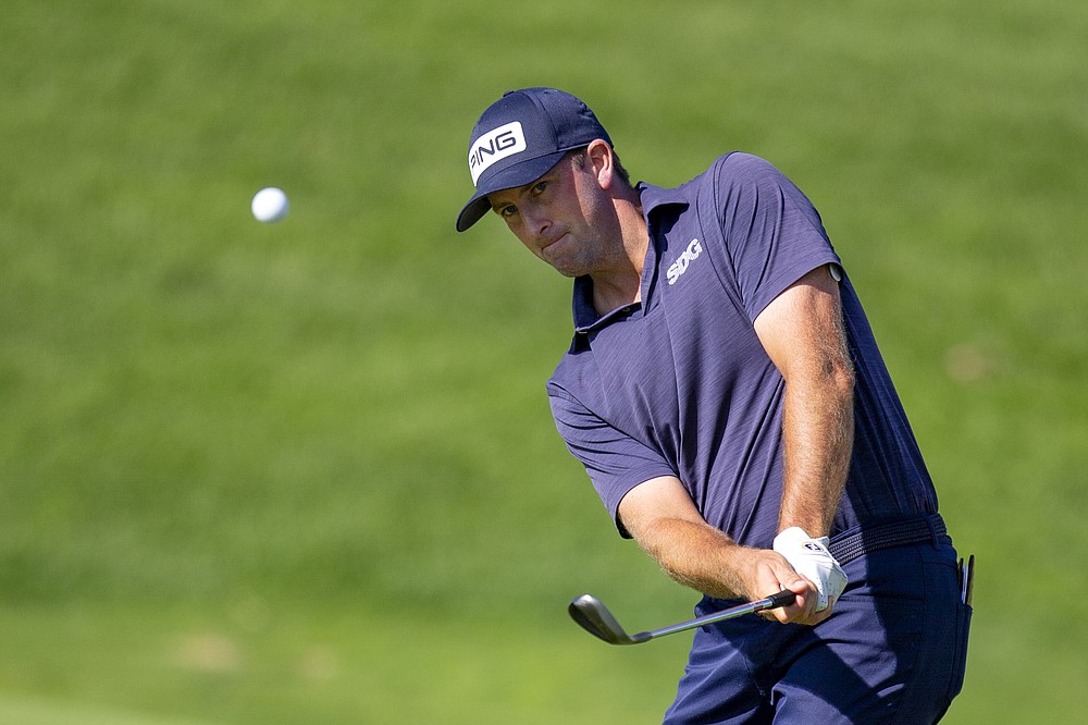 Michael Thompson chips on the 9th hole of the during the first round of the 3M Open golf tournament in Blaine, Minn., Thursday, July 23, 2020. (AP Photo/Andy Clayton- King)