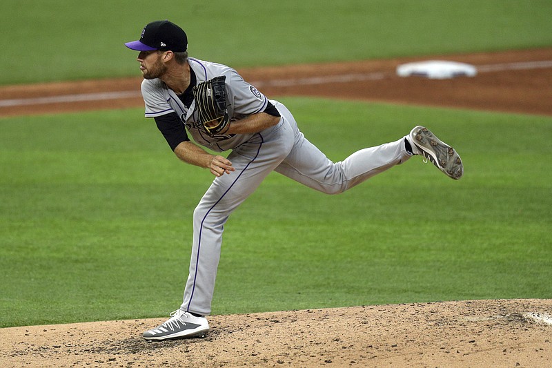 Colorado Rockies pitcher Daniel Bard throws in the fifth inning of Saturday's game against the Texas Rangers in Arlington, Texas. - Photo by Richard W. Rodriguez of The Associated Press