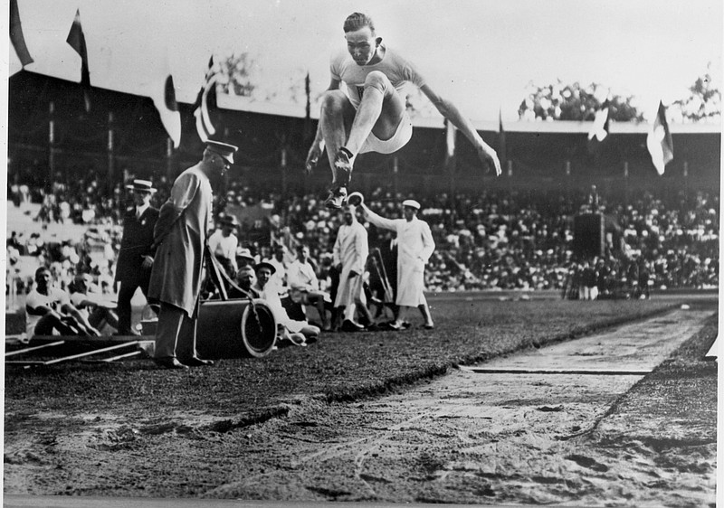 Albert Gutterson, of the United States, competes in the long jump at the 1912 Olympic Games in Stockholm. Gutterson went on to win the gold. - Photo by Pressens Bild/TT via The Associated Press