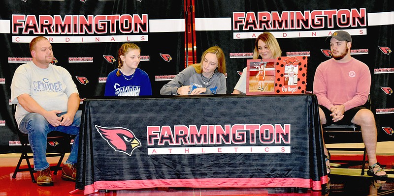 STAFF PHOTO/Farmington 2020 graduate Audrey Culpepper recently signed a national letter of intent to play women's college basketball at Crowder College, of Neosho, Mo. She was accompanied by her family (from left): Mike Mitchell, stepfather, Jenna Culpepper, sister; Audrey; Sara Mitchell, mother; and Jayden Carter, brother. story.lead_photo.caption
