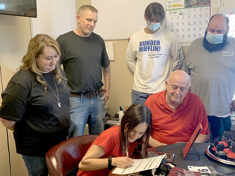 Photo submitted
Former Siloam Springs cross country standout Kailey Pentz recently signed a letter of intent with the University of Arkansas-Rich Mountain. Pictured with Pentz, from left, are her mother Christina Pentz and father Michael Pentz, cousin Jackson Ball, grandfather Ernie Ball and uncle Andy Ball.