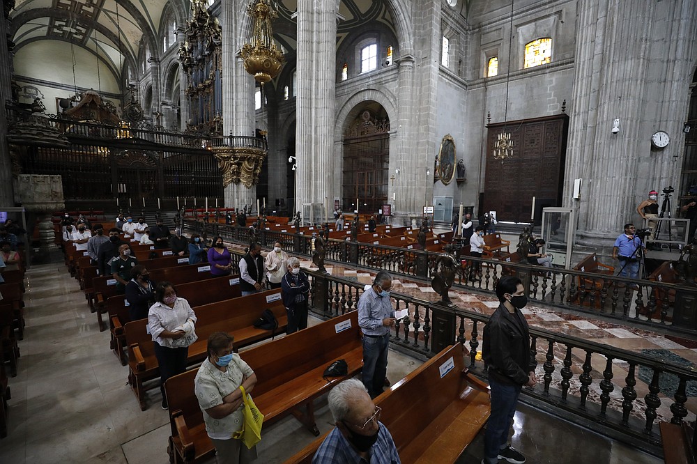 Catholic faithful, wearing masks and practicing distancing during the coronavirus pandemic, attend Mass at Metropolitan Cathedral in Mexico City.
(AP/Rebecca Blackwell)