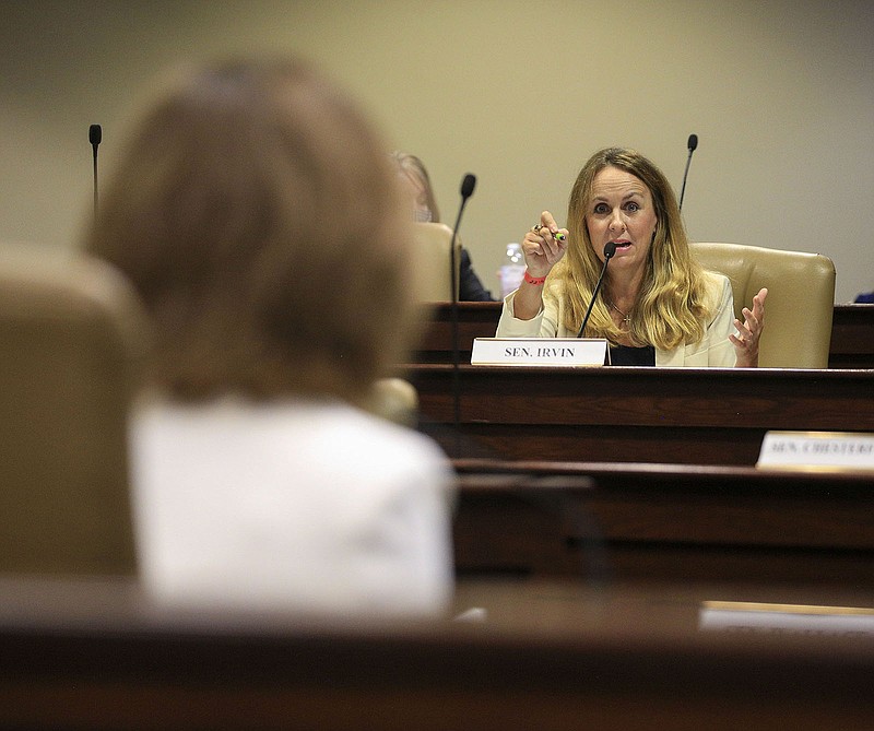 Sen. Missy Irvin, right, R-Mountain View, asks Stephanie Williams, chief of staff for the Arkansas Department of Health, a question Tuesday July 28, 2020 in Little Rock during an Arkansas Legislative Council meeting at the state Capitol. (Arkansas Democrat-Gazette/Staton Breidenthal)