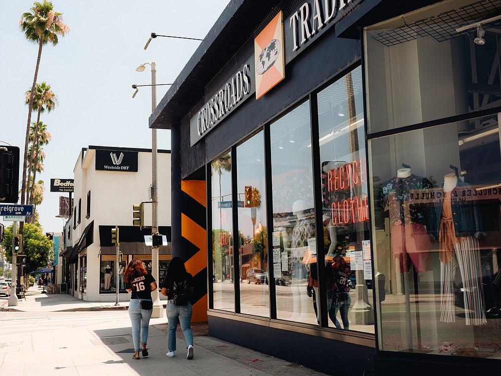 The exterior of Crossroads Trading, a consignment store with used and new clothing, in Studio City, Calif., July 23, 2020. Sites like Poshmark and Thredup have thrived during the pandemic, but your neighborhood thrift store is not doing so well. (Rozette Rago/The New York Times) 