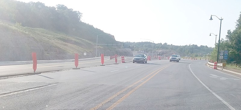 Keith Bryant/The Weekly Vista
Lights and pavement were in place last week to deactivate the traffic circle near the Bentonville and Bella Vista border.