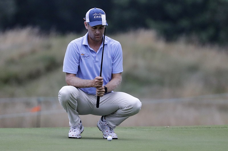 Brendon Todd lines up a putt on the second hole during the second round of the World Golf Championship-FedEx St. Jude Invitational Friday in Memphis, Tenn. - Photo by Mark Humphrey of The Associated Press story.lead_photo.caption