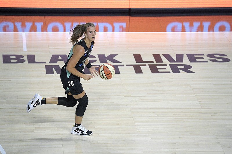 New York Liberty forward Sabrina Ionescu (20) pushes the ball up the court during the first half of Saturday's WNBA game against the Seattle Storm in Ellenton, Fla. - Photo by Phelan M. Ebenhack of The Associated Press story.lead_photo.caption