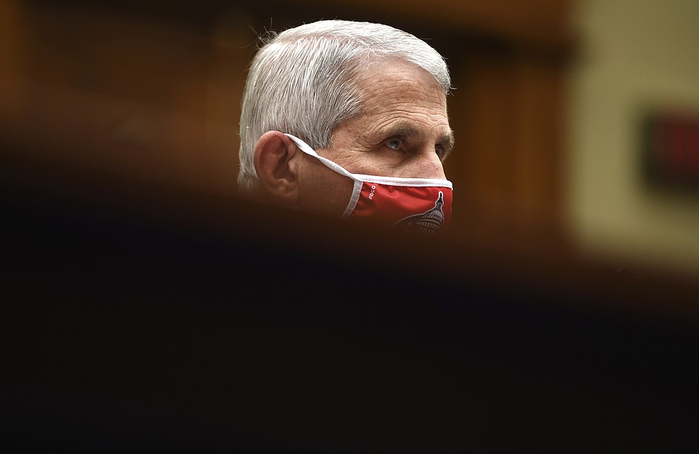 Dr. Anthony Fauci, director of the National Institute for Allergy and Infectious Diseases, listens during a House Subcommittee on the Coronavirus crisis hearing, Friday, July 31, 2020 on Capitol Hill in Washington. (Kevin Dietsch/Pool via AP)