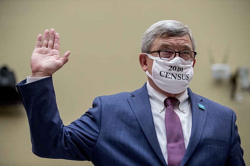 Census Bureau Director Steven Dillingham wears a mask with the words "2020 Census" as he is sworn in to testify before a House Committee on Oversight and Reform hearing on the 2020 Census on Capitol Hill, Wednesday, July 29, 2020, in Washington. (AP Photo/Andrew Harnik) story.lead_photo.caption