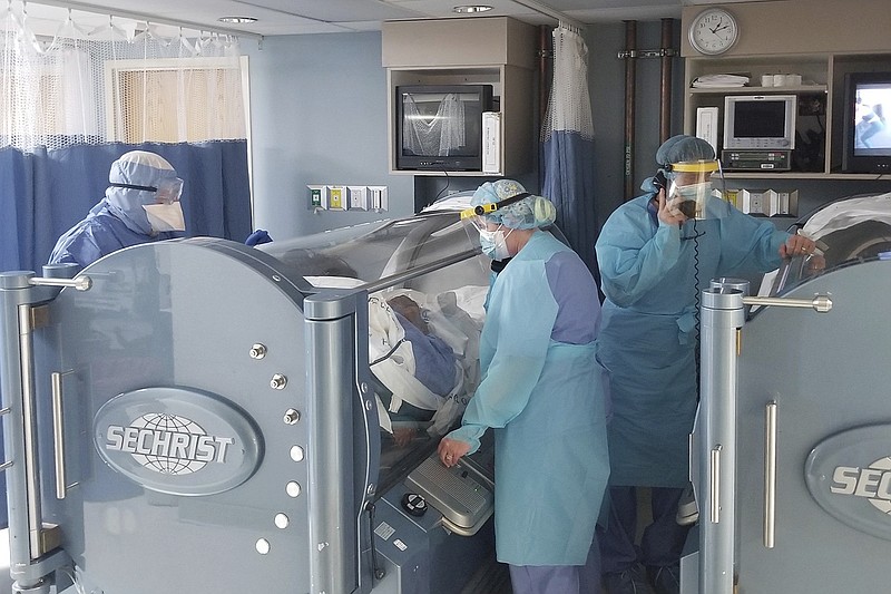 Doctors try pressurized oxygen chambers in COVID fight Hot Springs