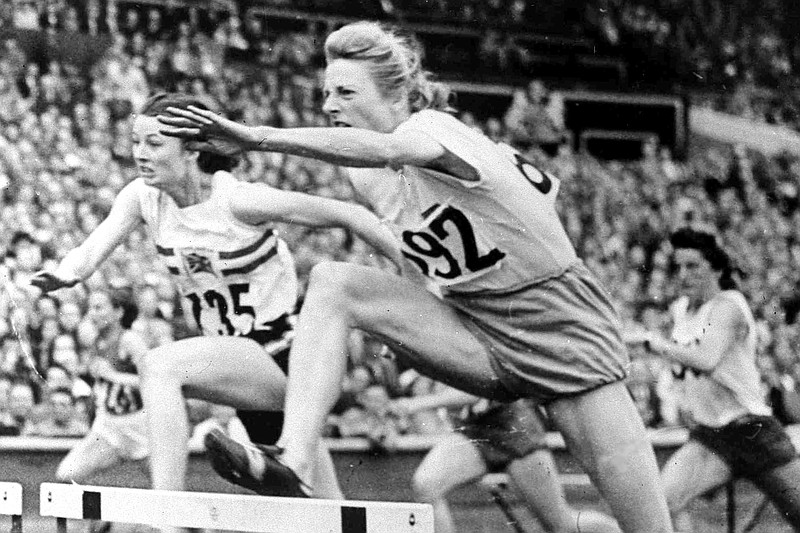 Fanny Blankers-Koen of Holland leaps the last hurdle in the women's Olympic Games 80-meter hurdles final on Aug. 4, 1948, at Wembley Stadium in London. Blankers-Koen was 30, the oldest woman among the track and field entries and considered past her prime. But she won the 100 and 200 meters, the 80-meter hurdles and the 4x100-meter relay. She remains the only female track and field athlete to win four gold medals at a single Olympics. - The Associated Press file photo