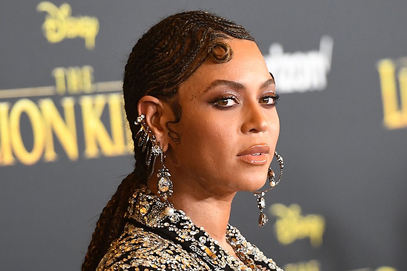 Beyonce arrives for the world premiere of Disney’s “The Lion King” at the Dolby theatre in this 2019 photo. The singer’s new visual album, “Black Is King,” premiered on Disney Plus on Friday.

(AFP/Getty Images/TNS/Robyn Beck)