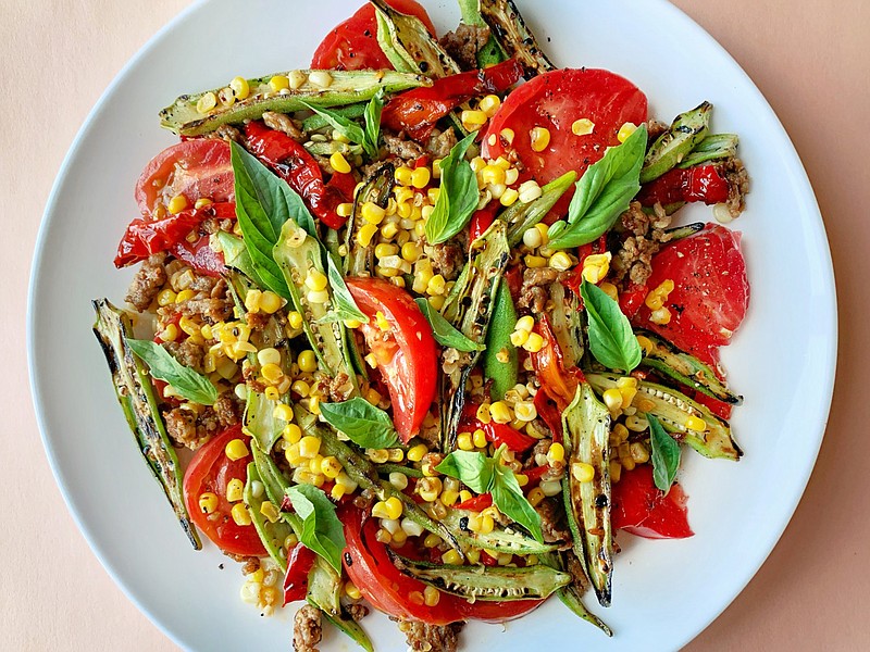Charred okra, corn and sweet peppers combine in this ode-to-summer dish. (TNS/Los Angeles Times/Ben Mims)