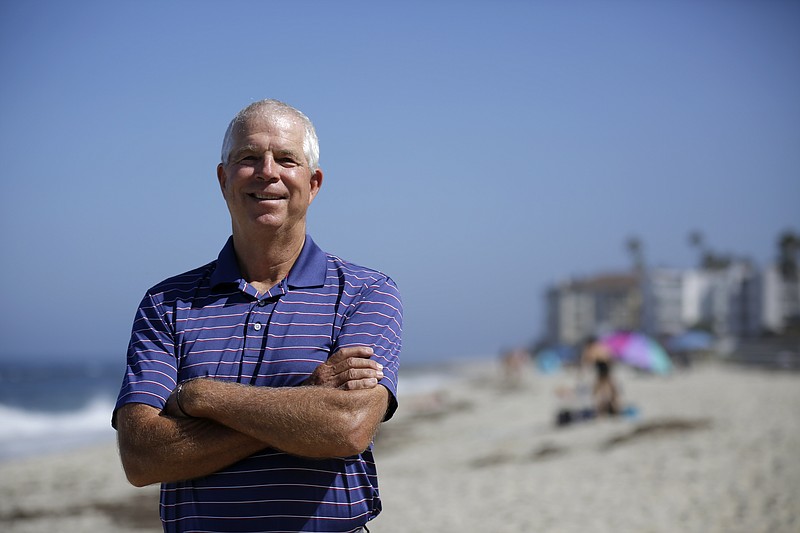 Peter Schnugg stands along the beach on July 31 in San Diego. The former waterpolo athlete missed his chance to go to the Olympics in 1980 when the U.S. decided to boycott the games to protest the Soviet Union's invasion of Afghanistan. Now he's unsure if he'll get the chance to see his niece, Maggie Steffens, try for a third consecutive gold medal with the U.S. women's water polo team. - Photo by Gregory Bull of The Associated Press