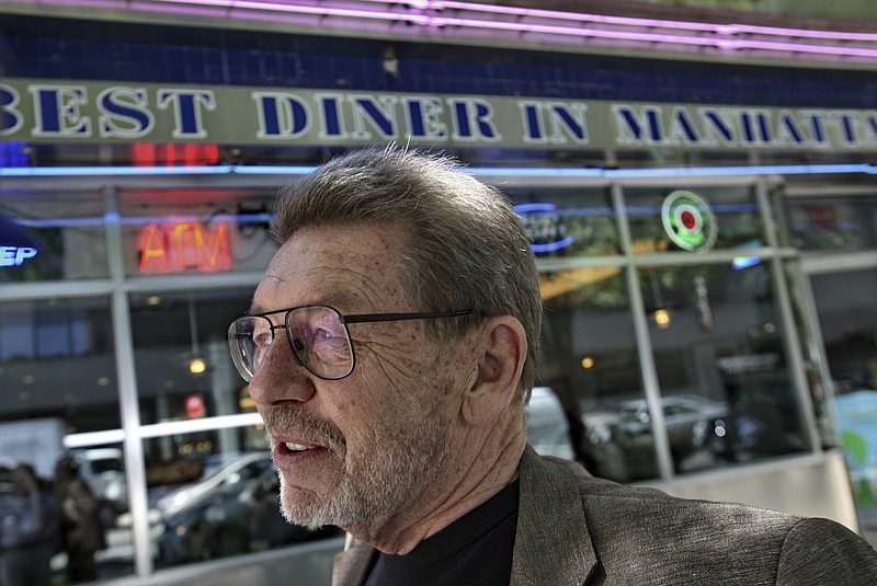FILE - In this June 5, 2007 file photo, Pete Hamill responds during an interview at the Skylight Diner in New York. The longtime New York City newspaper columnist and author has died. His brother Denis Hamill said Pete died Wednesday, Aug. 5, 2020 in Brooklyn. (AP Photo/Bebeto Matthews, File)