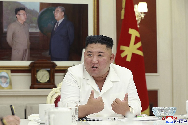 In this photo provided by the North Korean government, North Korean leader Kim Jong Un, presides over an executive policy council meeting at the ruling Workers’ Party in Pyongyang, North Korea, Wednesday. Kim Jong Un directed his government agencies to act immediately to stabilize the livelihoods of residents in a city locked down over coronavirus concerns, state media reported Thursday. Independent journalists were not given access to cover the event depicted in this image distributed by the North Korean government. The content of this image is as provided and cannot be independently verified. Korean language watermark on image as provided by source reads: "KCNA" which is the abbreviation for Korean Central News Agency. - Korean Central News Agency/Korea News Service via AP