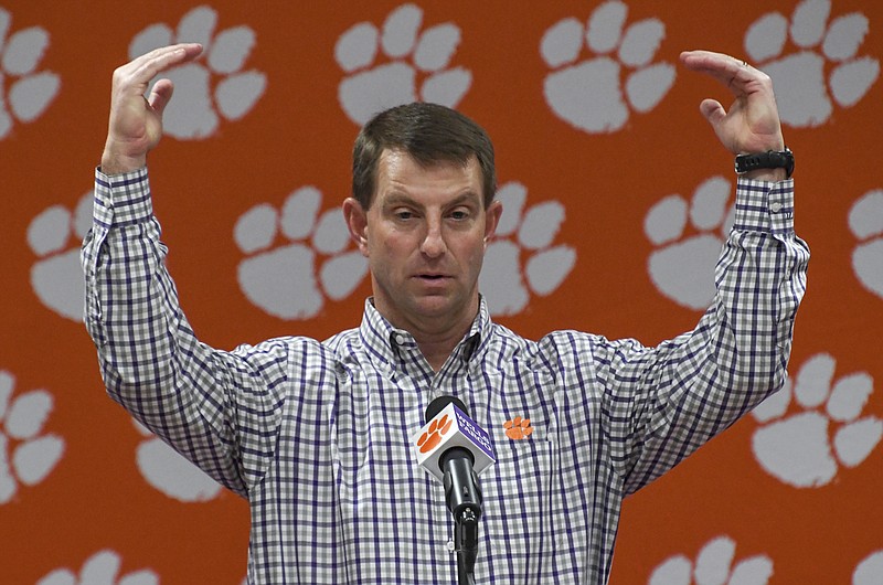 FILE - In this Feb. 5, 2020, file photo, Clemson coach Dabo Swinney speaks during an NCAA college football news conference at the Allen Reeves Football Complex in Clemson, S.C. Clemson came up short of a national title last January, but are one of the frontrunners to capture the crown in whatever season college football is able to fashion amid the coronavirus pandemic. (Ken Ruinard/The Independent-Mail via AP, File)