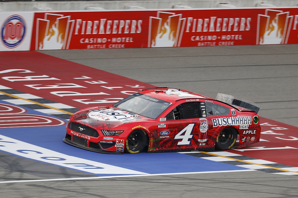Kevin Harvick crosses the finish line during a NASCAR Cup Series auto race at Michigan International Speedway in Brooklyn, Mich., Saturday, Aug. 8, 2020. (AP Photo/Paul Sancya)