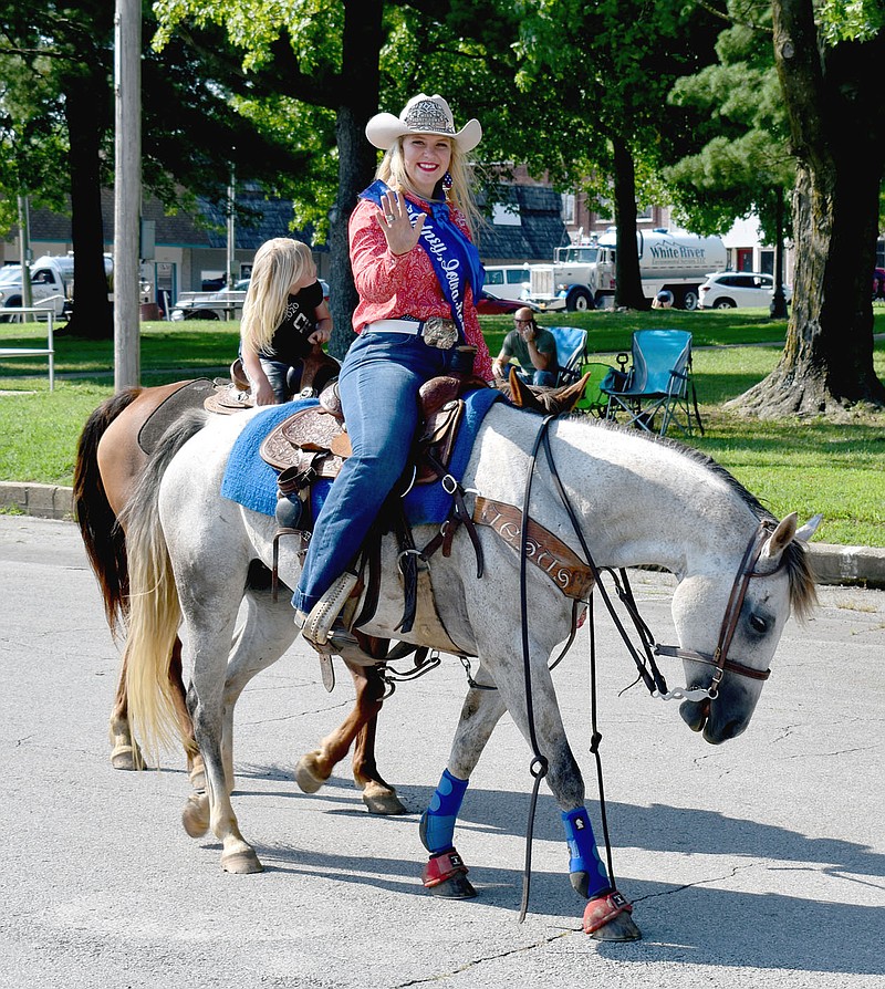 MARK HUMPHREY  ENTERPRISE-LEADER/Guest royalty, Miss Sidney, Ia. Teigan Parker and her 10-year-old quarterhorse Dixie appeared in the 67th annual Lincoln Rodeo parade Saturday. Parker, 19, utilizes her title to advocate for the sport of rodeo.