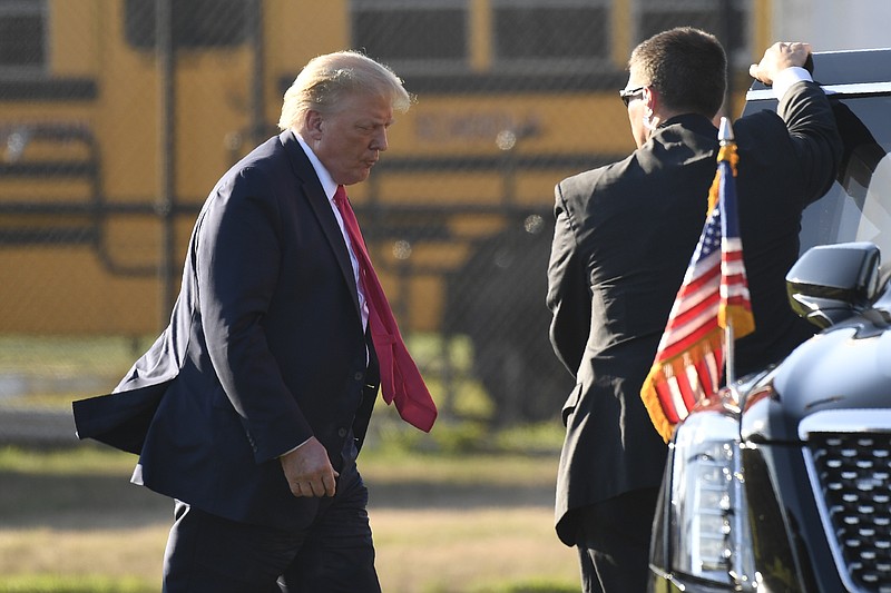 President Donald Trump walks to his car after arrive in Southampton, N.Y., on Marine One, Saturday. Trump is attending two fundraisers during his visit to the Hamptons. - AP Photo/Susan Walsh story.lead_photo.caption