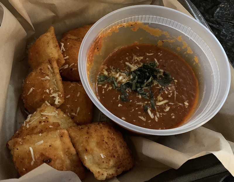 A big vat of marinara sauce accompanies Sauce(d)'s fried ravioli.
(Arkansas Democrat-Gazette/Eric E. Harrison)