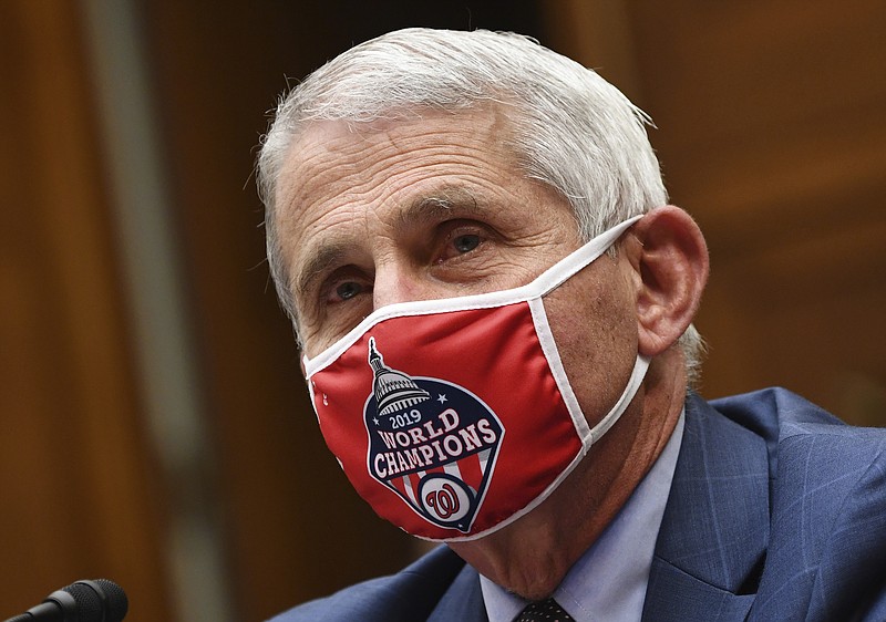 Dr. Anthony Fauci, director of the National Institute for Allergy and Infectious Diseases, testifies during a House Subcommittee hearing on the Coronavirus crisis, Friday, July 31, 2020 on Capitol Hill in Washington.  (Kevin Dietsch/Pool via AP)