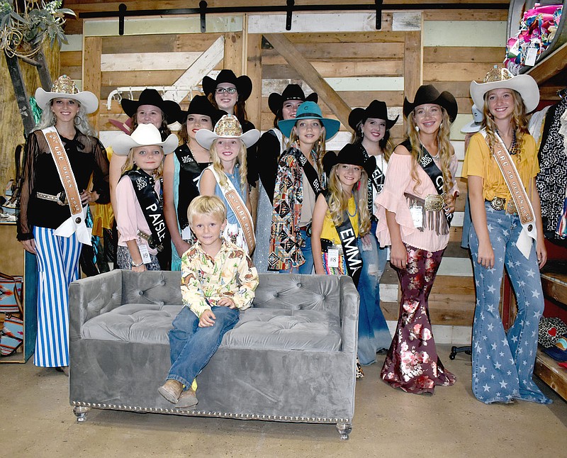 MARK HUMPHREY  ENTERPRISE-LEADER/Gauge Perkins, 4, 2019 Lincoln Riding Club Lil' Mister, finds himself surrounded by 2019 LRC royalty and 2020 contestants for queen, junior queen and princess during Speech and Modeling competition held Wednesday, Aug. 5 at the Morrow Country Store.