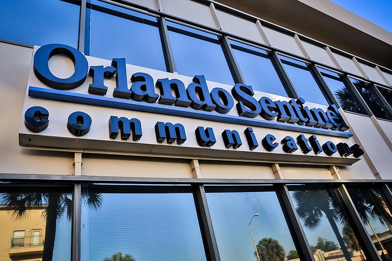 This Tuesday, May 6, 2014, photo shows the exterior of the Orange Avenue side of the Orlando Sentinel building in Orlando, Fla. In an announcement Wednesday, Aug. 12, 2020, Tribune Publishing Company said it's closing the newsrooms of five newspapers including The Daily News in Manhattan, the Orlando Sentinel and The Capital Gazette in Annapolis, Maryland. The Chicago-based newspaper chain said the decision was made as the company evaluates its real estate needs in light of health and economic conditions related to the coronavirus pandemic. (Joshua C. Cruey/Orlando Sentinel via AP)
