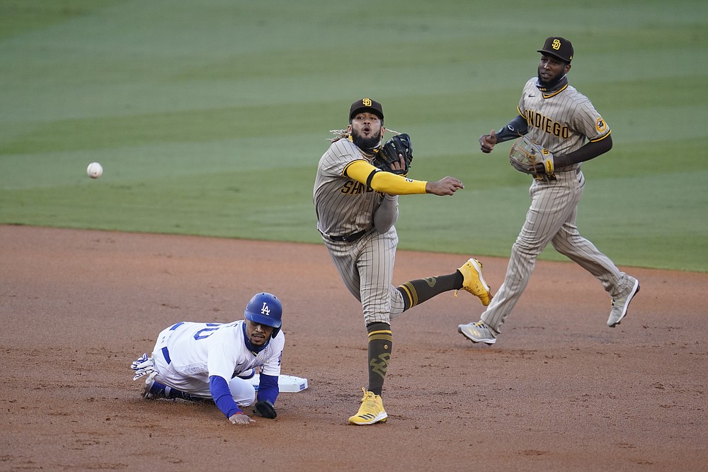 San Diego Padres' Fernando Tatis Jr. wears nike cleats while batting during  the sixth inning of a baseball game against the Cincinnati Reds, Wednesday,  May 3, 2023, in San Diego. (AP Photo/Gregory