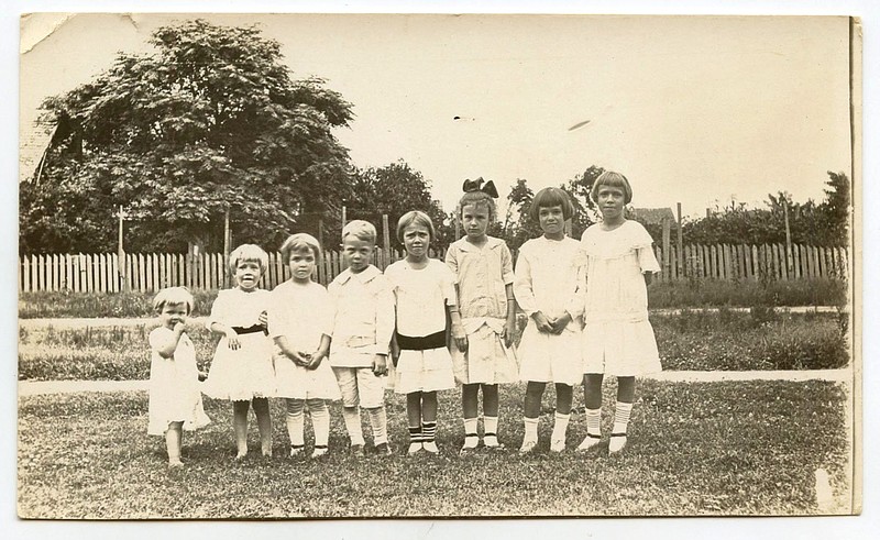 ENGLAND, 1916: The photographer had successfully lined up eight children in what would have been a carefully prepared “stair step formation” 104 years ago. The names appear on the back of the card: (from left) Mary Joe Webb, Dorothy and Carolyn McAlister, Simpson Williams, Ruby Webb, Minnie Jones, Emma McAlister and Kathleen Webb.
Arkansas Postcard Past, P.O. Box 2221, Little Rock, AR 72203 story.lead_photo.caption