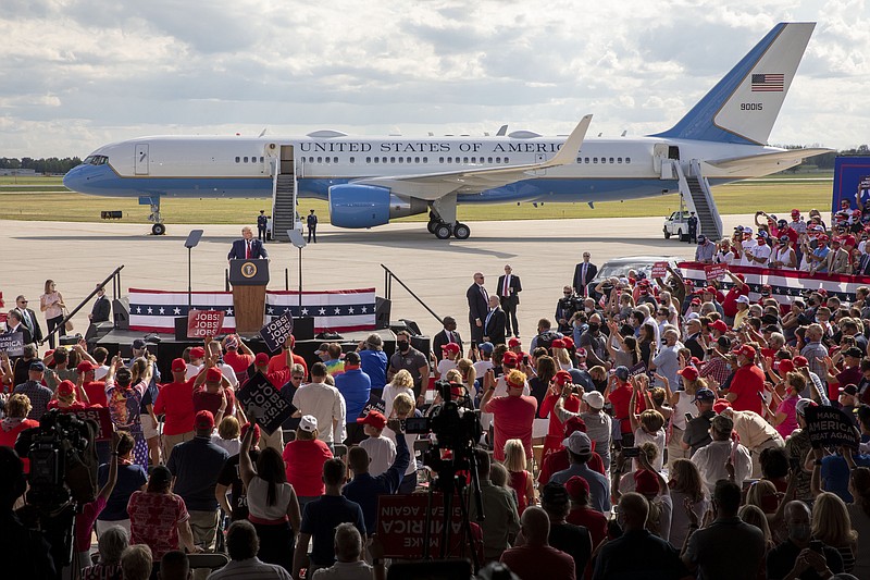President Donald Trump speaks at an event at the Wittman Regional Airport Monday, Aug. 17, 2020, in Oshkosh, Wis. (AP Photo/Mike Roemer)