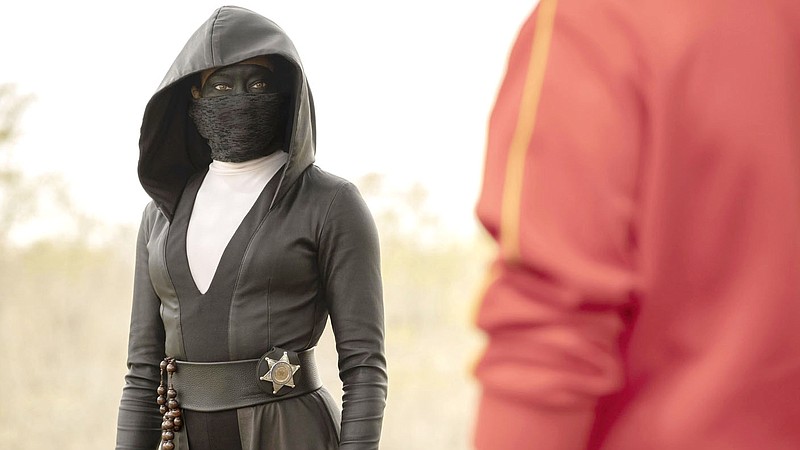 Regina King is a police officer turned masked vigilante in "Watchmen." MUST CREDIT: Mark Hill/HBO