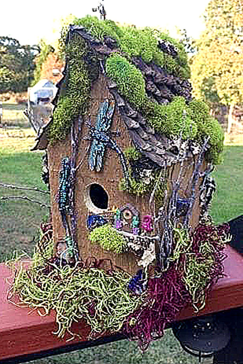 COURTESY PHOTO/A one-of-a-kind bird house by Simply MarleyC takes a number of elements from nature, including multiple types of moss and bark.