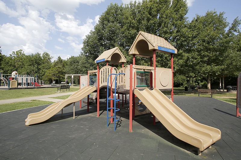 NWA Democrat-Gazette/DAVID GOTTSCHALK One of the playground areas Monday, August 6, 2018, at Gulley Park in Fayetteville. The Fayetteville Parks and Recreation Advisory Board on Monday will go over the proposed master plan for Gulley Park. Suggested amenities include an activity hub for children, a splash pad and a dog park.