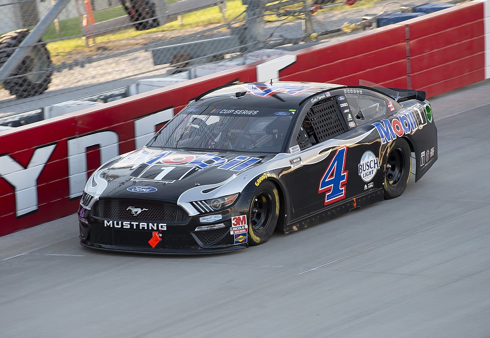 Kevin Harvick (4) competes during a NASCAR Cup Series auto race at Dover International Speedway, Sunday, Aug. 23, 2020, in Dover, Del. (AP Photo/Jason Minto)