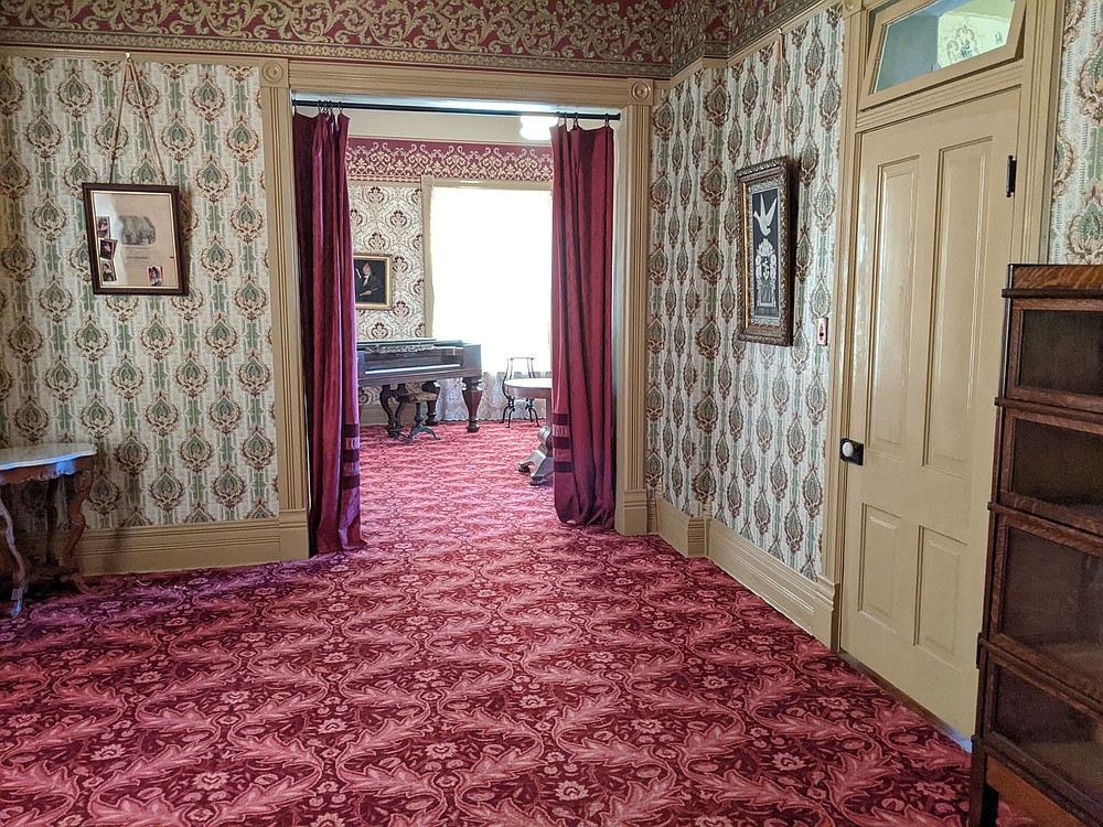 The 1895 Hawkins House, one of the first homes of the Rogers Historical Museum, is currently undergoing some renovations while it is closed to the public. The collections that normally fill the house have been moved into storage.
(Courtesy Photos)