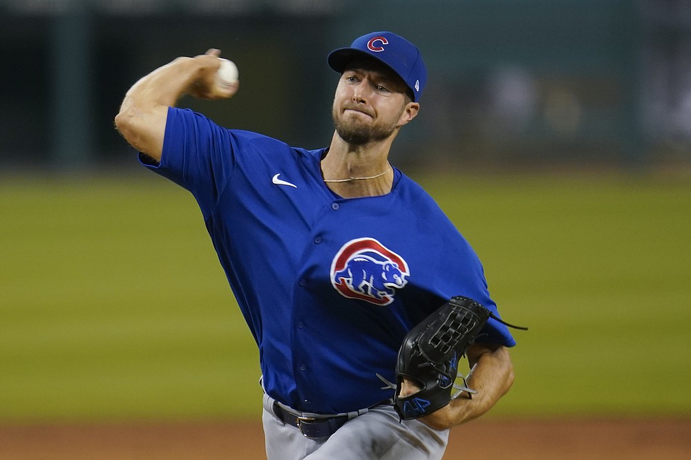 Cubs earn 11,000th victory behind Baez's HRs