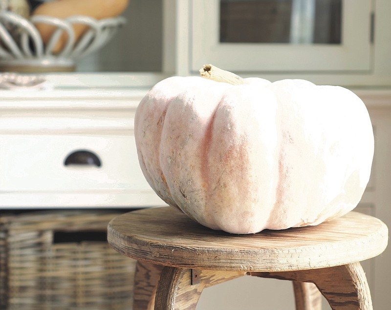 When decorating for the season, don’t rely on factory-made pretend décor, says "Welcome Home" author Myquillyn Smith. This fall, instead of a dozen plastic pumpkins, make a statement with one big, quirky real pumpkin.

(Photo courtesy Myquillyn Smith)