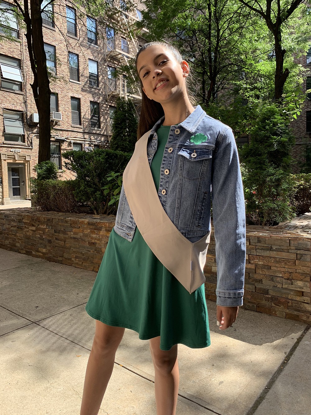 In an undated image provided by the Girl Scouts of the USA, the Girl Scouts have new uniforms. A vest designed for the modern Girl Scout must have pockets, and those pockets must be large enough to fit the largest model of the iPhone. (Girl Scouts of the USA via The New York Times) -- NO SALES; FOR EDITORIAL USE ONLY WITH NYT STORY GIRL SCOUTS UNIFORM BY JESSICA TESTA FOR AUG. 25, 2020. ALL OTHER USE PROHIBITED. --
