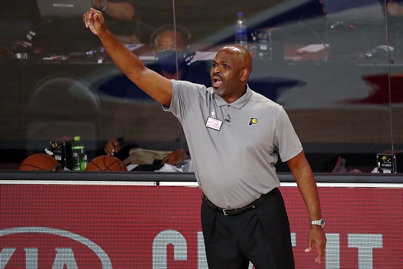 Indiana Pacers head coach Nate McMillan reacts on the sideline during the second half of Game 3 of an NBA basketball first-round playoff series against the Miami Heat, Saturday, Aug. 22, 2020, in Lake Buena Vista, Fla. (Kim Klement/Pool Photo via AP)