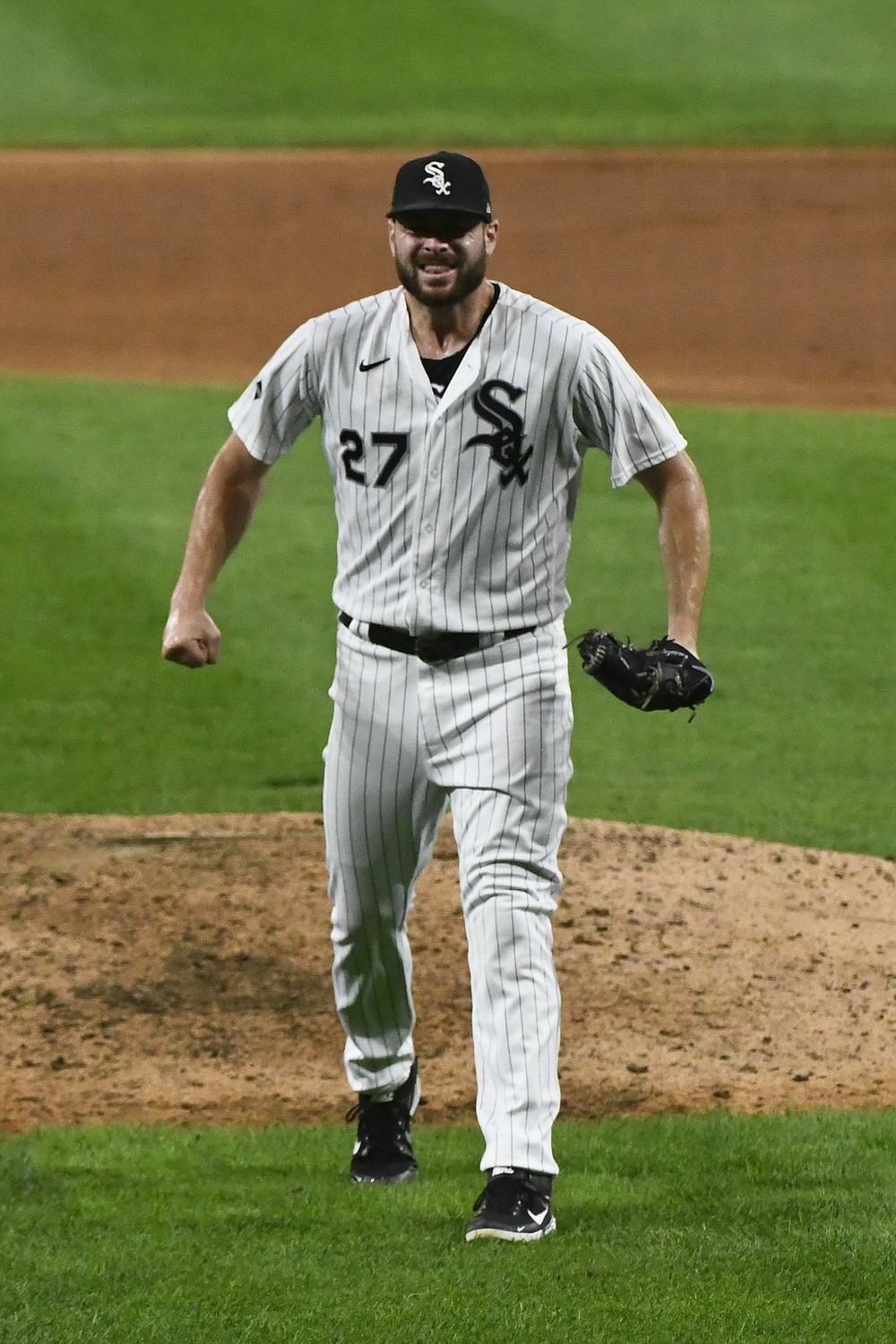Chicago White Sox starting pitcher Lucas Giolito (27) reacts after closing out a no hitter at the end of a baseball game against the Pittsburgh Pirates, Tuesday, Aug. 25, 2020, in Chicago. (AP Photo/Matt Marton)