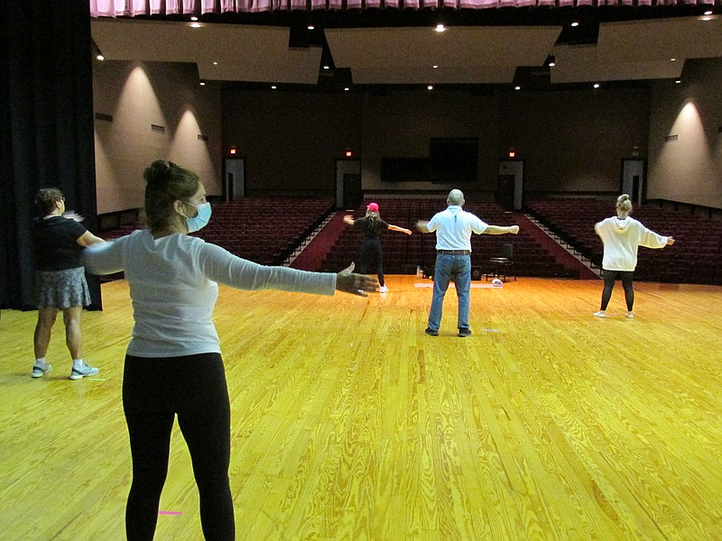 Distanced dance students follow instructor Jennifer Vaughn-Varney, center. - Submitted photo