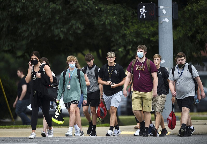 Students end the school day, Monday, August 24, 2020 at Bentonville High School in Bentonville. Check out nwaonline.com/200825Daily/ for today's photo gallery. 
(NWA Democrat-Gazette/Charlie Kaijo)