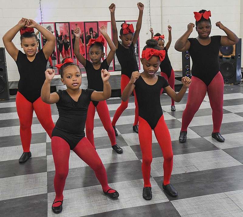 Members of the Ruby Red Diamonds Dance Team rehearse a dance number on August 18.-Photo by Grace Brown of The Sentinel-Record
