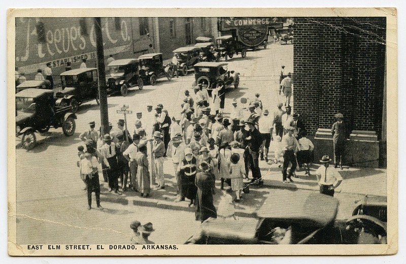 EL DORADO, 1928: The discovery of oil nearby had created a boom in the Union County seat a few years earlier. At the crowded intersection of Elm and Washington streets, pedestrians waited to cross streets bustling with what appear to be mostly Model T Fords.
Arkansas Postcard Past, P.O. Box 2221, Little Rock, AR 72203 story.lead_photo.caption