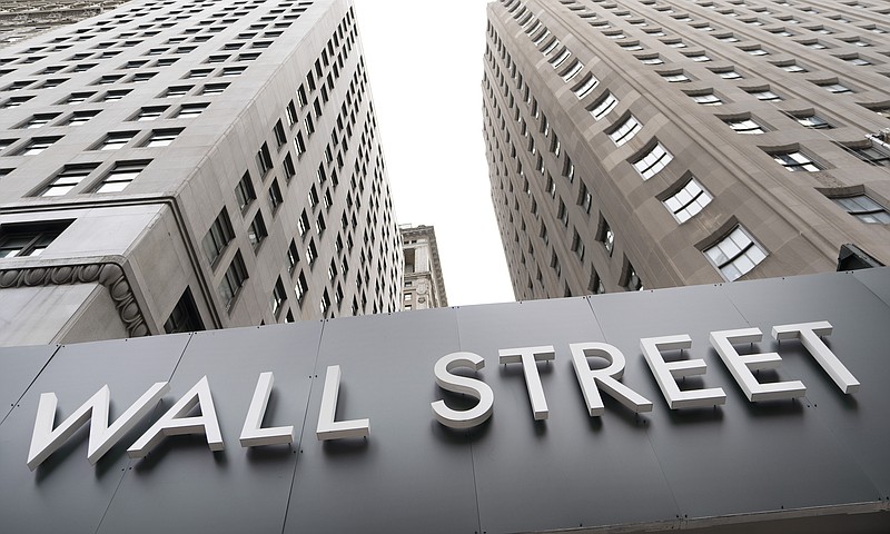 Buildings line Wall Street, Monday, Aug. 31, 2020, in New York. (AP Photo/Mark Lennihan)