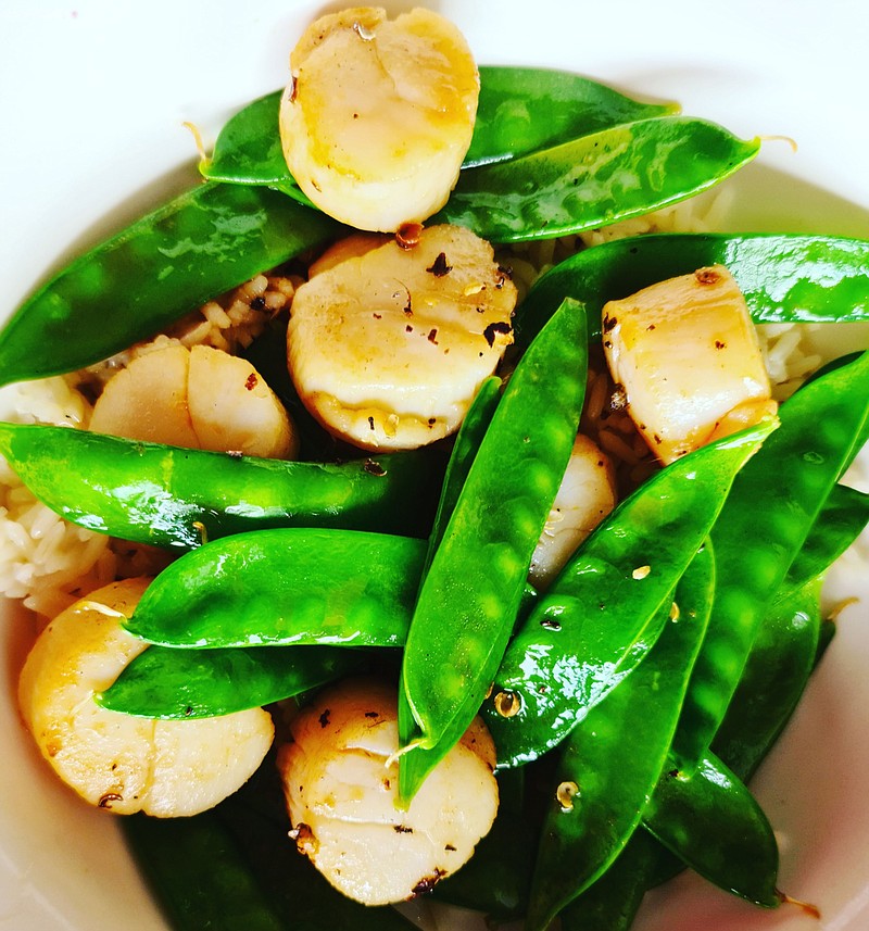 Oyster-Sauce Scallops and Mangetout
(Bloomberg/Richard Vines)