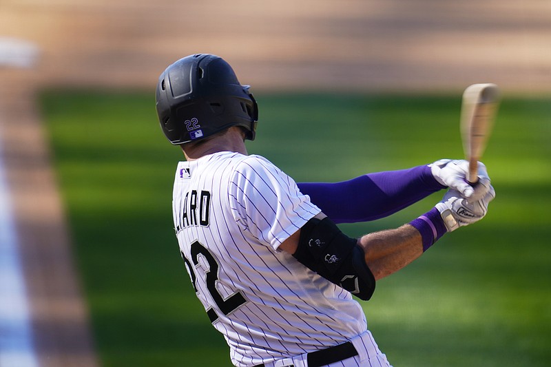 Colorado Rockies' Sam Hilliard connects for a three-run home run off San Francisco Giants relief pitcher Tyler Rogers in the seventh inning of a baseball game Wednesday, Sept. 2, 2020, in Denver. (AP Photo/David Zalubowski)