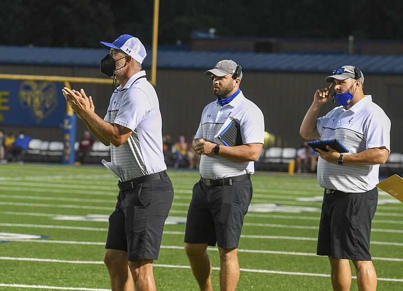 Lakeside coaches encourage their players from the sidelines during last week's game against Lake Hamilton at Chick Austin Field. The Rams travel to Sheridan tonight. – Photo by Grace Brown of The Sentinel-Record.